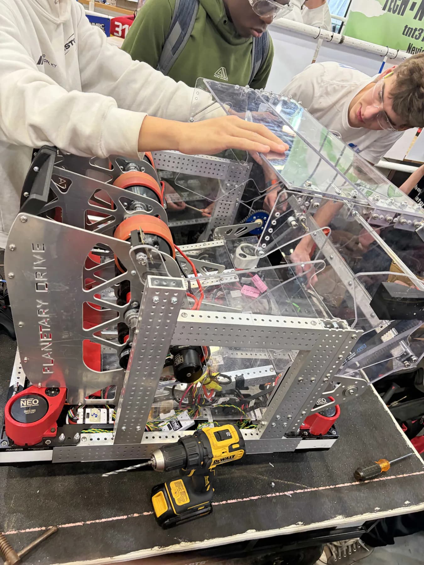 Planetary Drive students working together on a competition robot
